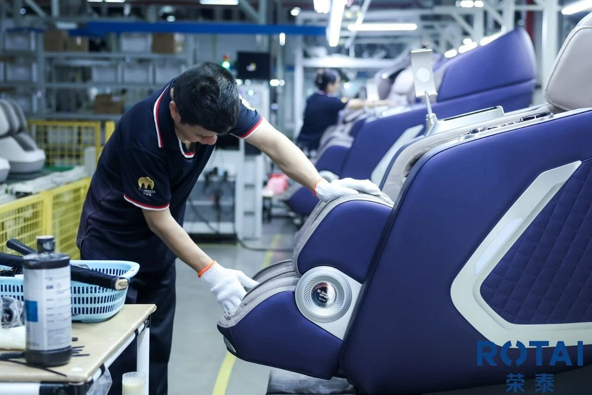 ROTAI technician inspecting a finished massage chair